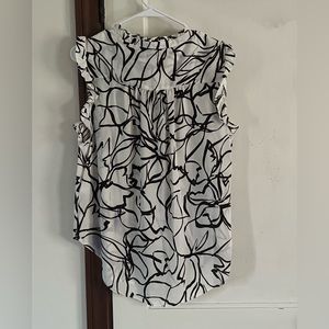 DKNY women’s blouse. White with brown design.  NWT